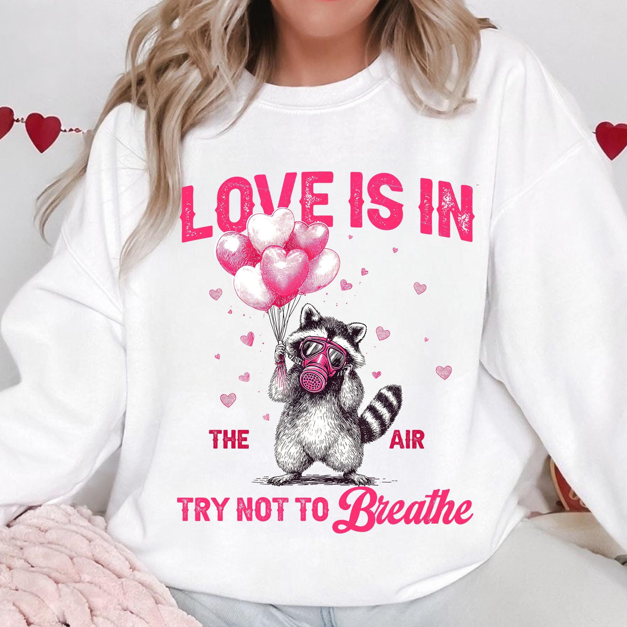 Love Is In The Air Try Not To Breathe Shirt, Funny Raccoon Valentine Sweatshirt, Sarcastic Anti Love Shirt, Feral Raccoon Humor